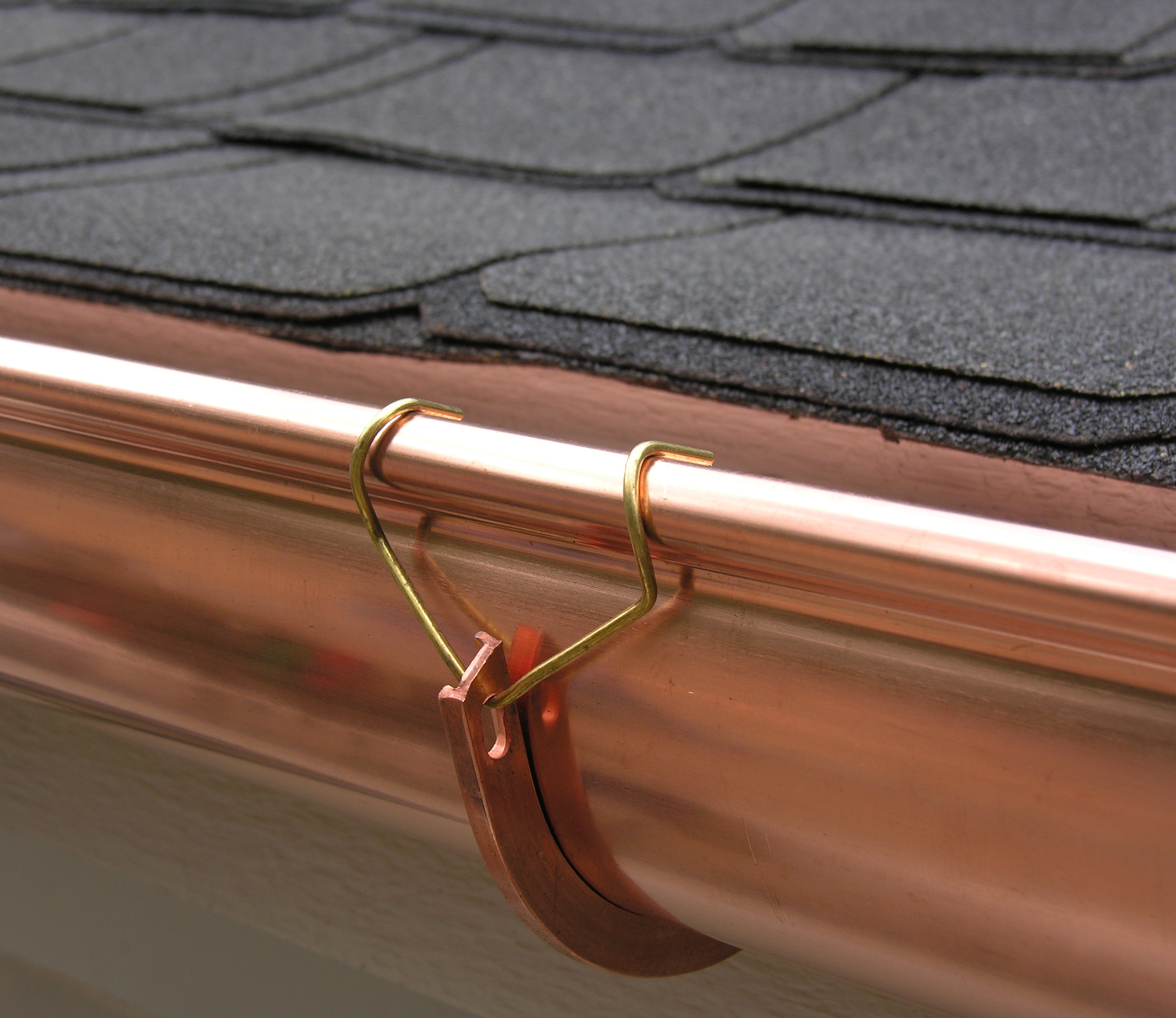 click for a larger view shank attached to gutter on house gutter hangers