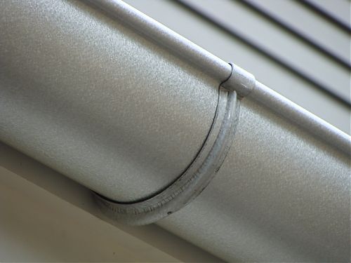 Decorative Hanger attached to a gutter | Gutter Hangers