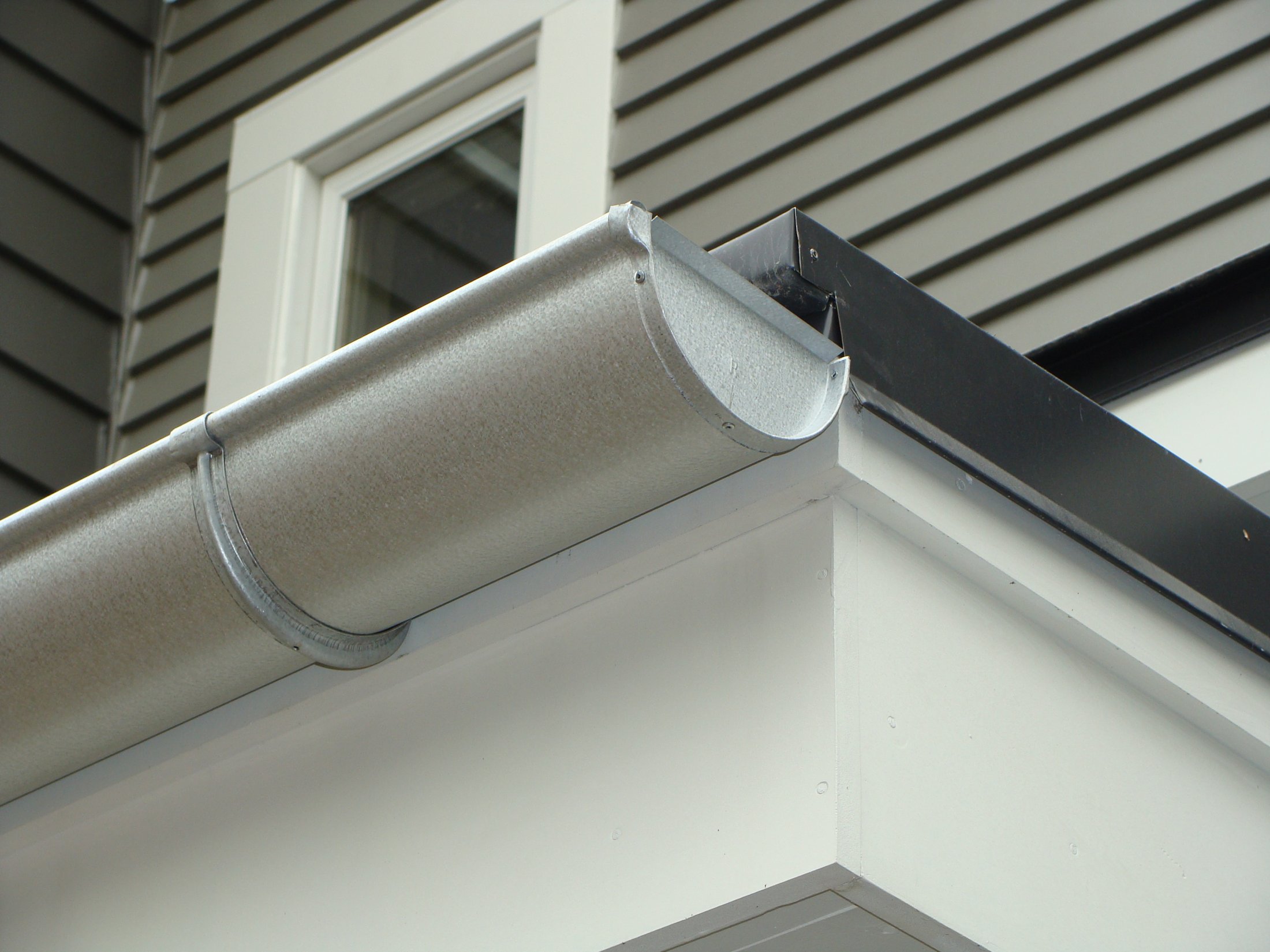 the half round gutter fitting that closes off the end of the half round